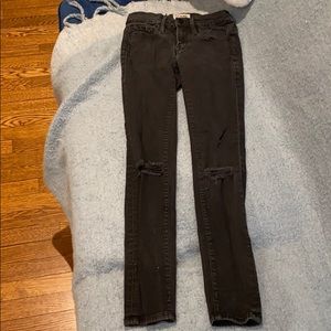 Frame distressed black denim skinny jeans